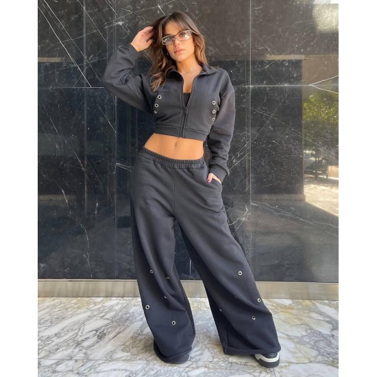 Pantalon con ojalillos metálicos Pantalon con ojalillos metálicos