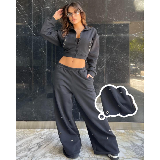 Pantalon con ojalillos metálicos Pantalon con ojalillos metálicos