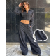Pantalon con ojalillos metálicos Pantalon con ojalillos metálicos